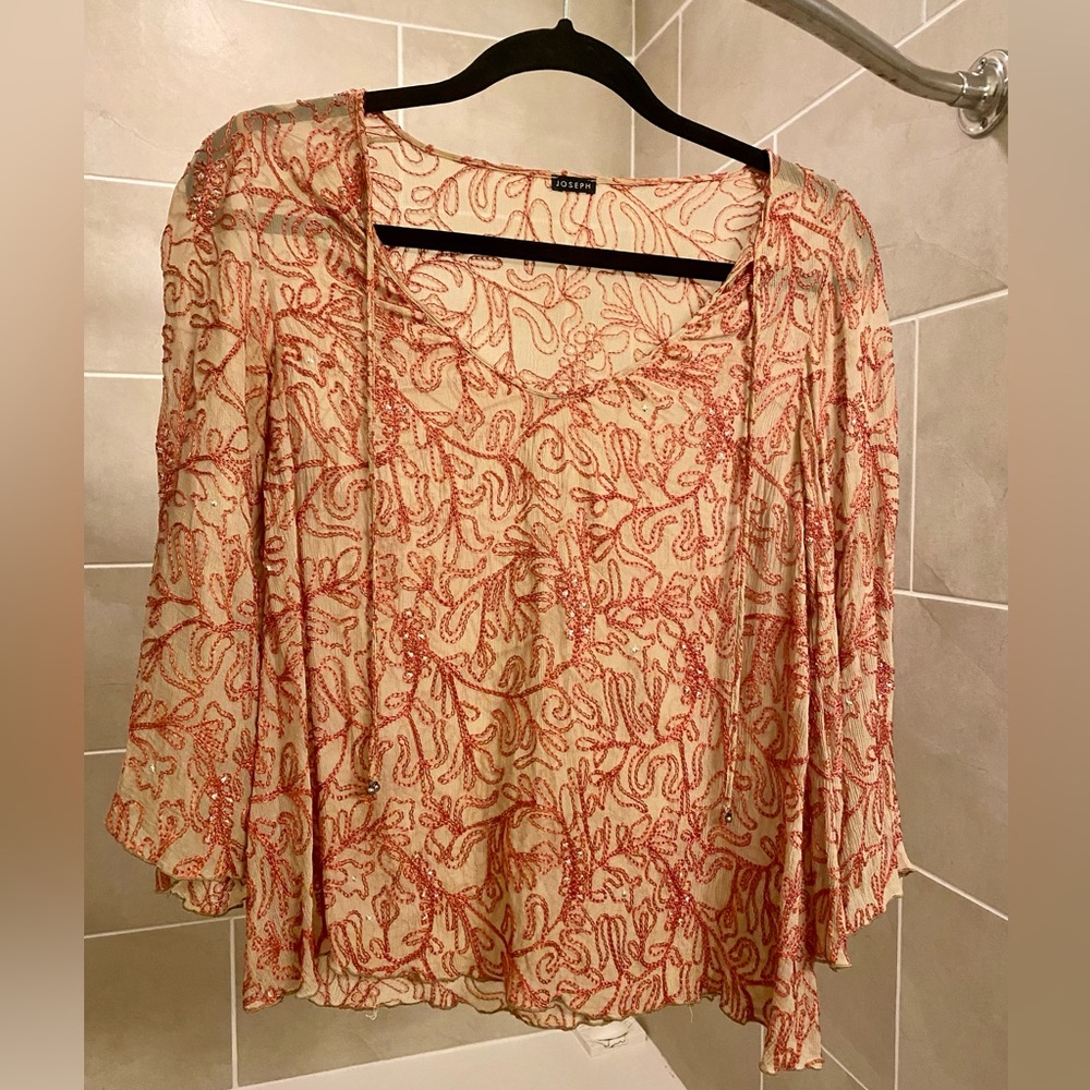 Vintage Joseph nude blouse with pink silk stitching. Size medium.